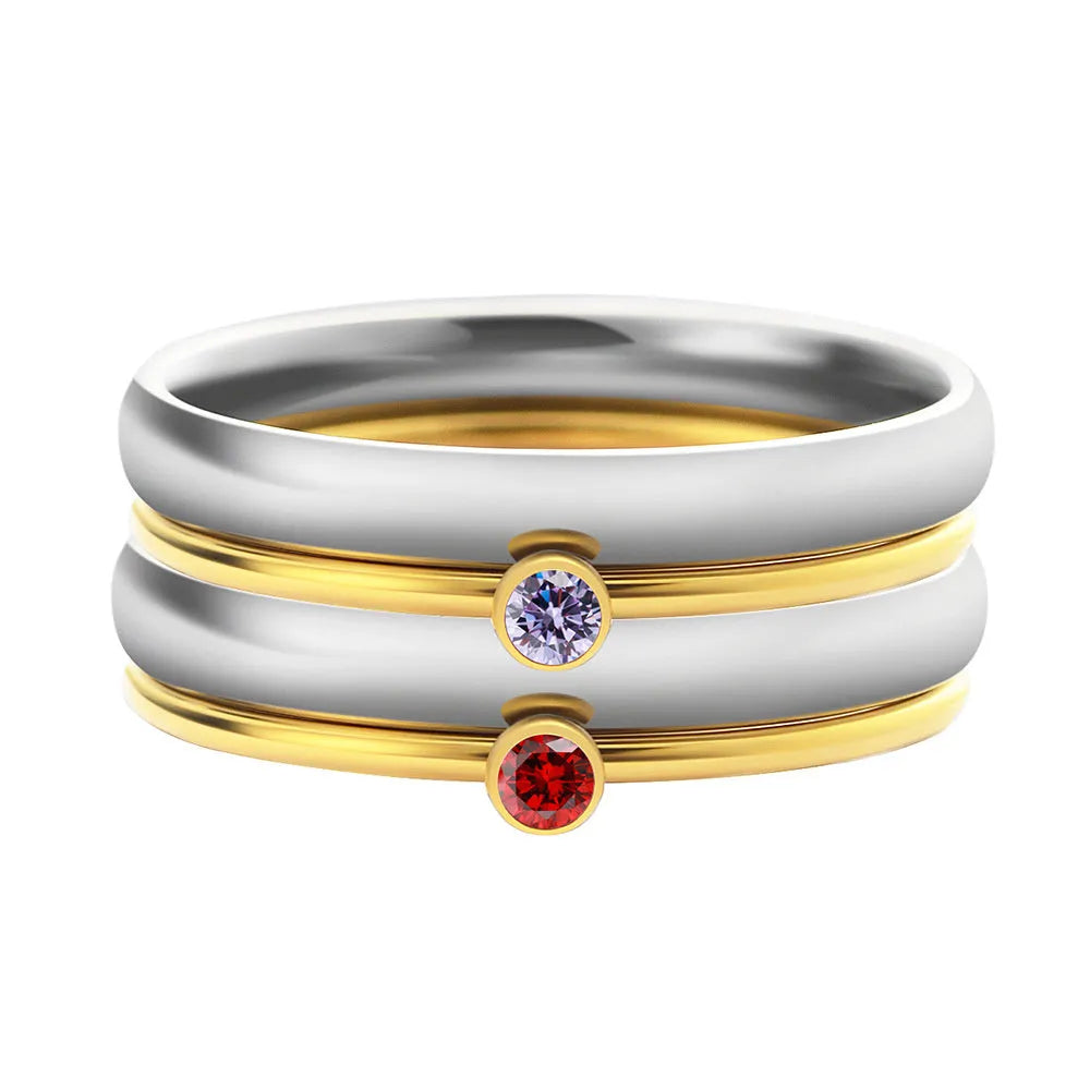 A geometric titanium steel ring featuring a December birthstone engraving.