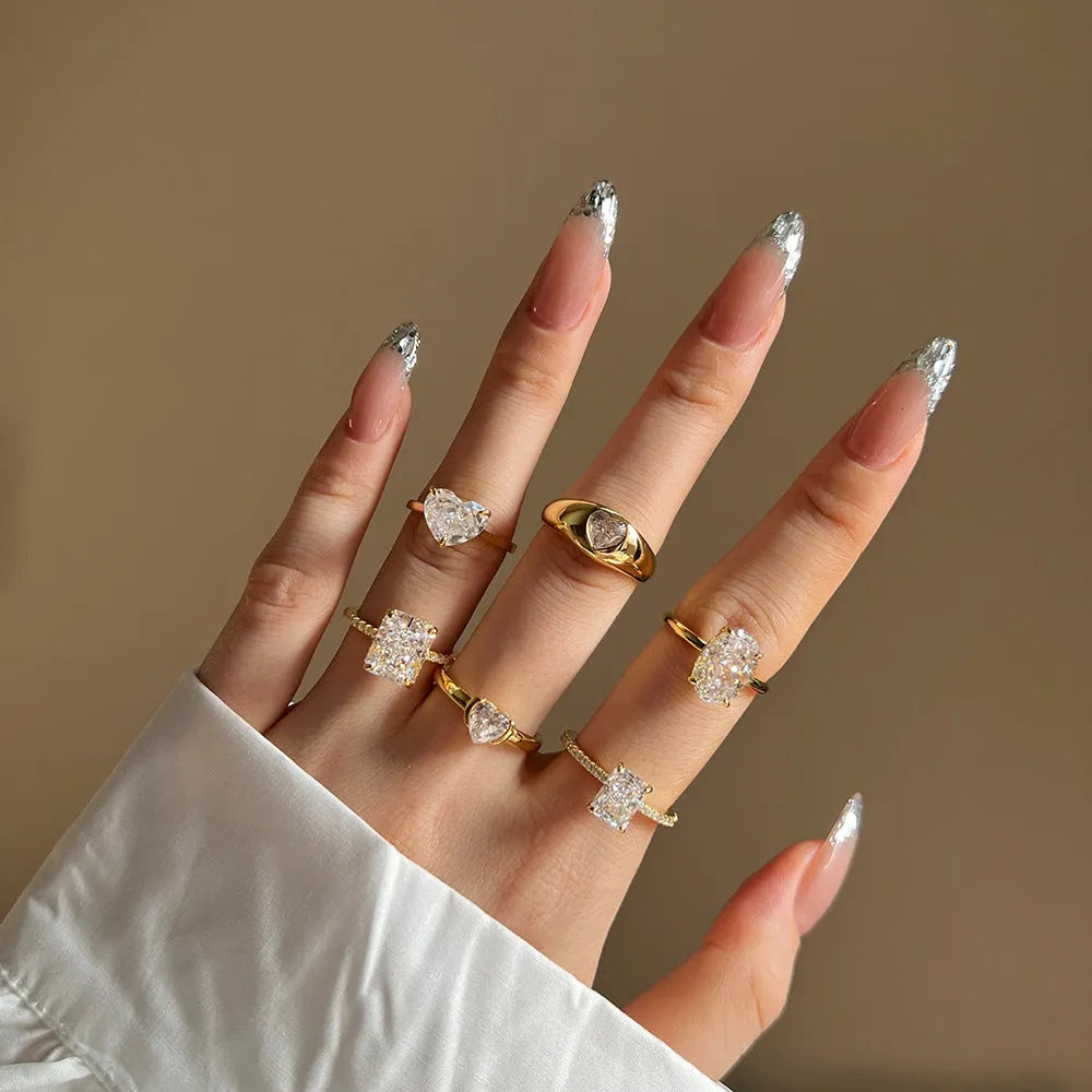 S925 sterling silver ring with golden heart design, women's heart-shaped geometric band, sizes 5 to 9.
