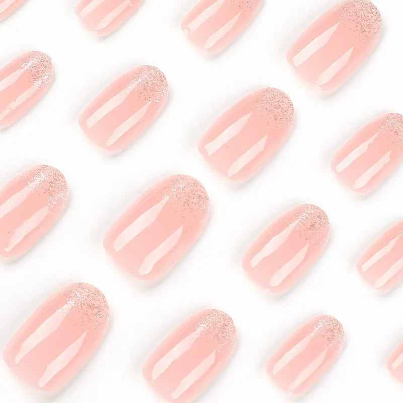 Short oval glitter French wear finished nail plates in colour JP2324 with glue included