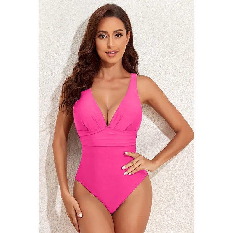 Women's solid colour cross-shoulder one-piece swimsuit in minimalist design