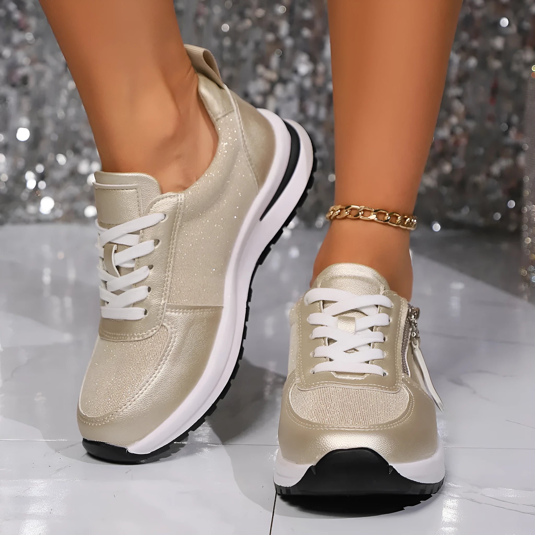 Women's flat lace-up pumps in gold colour with round toe and shallow cut design