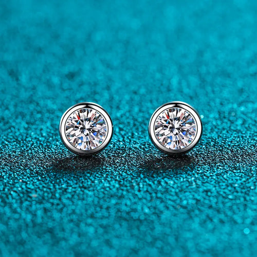 Geometric gold plated women's earrings with a moissanite stone on a 925 silver setting.