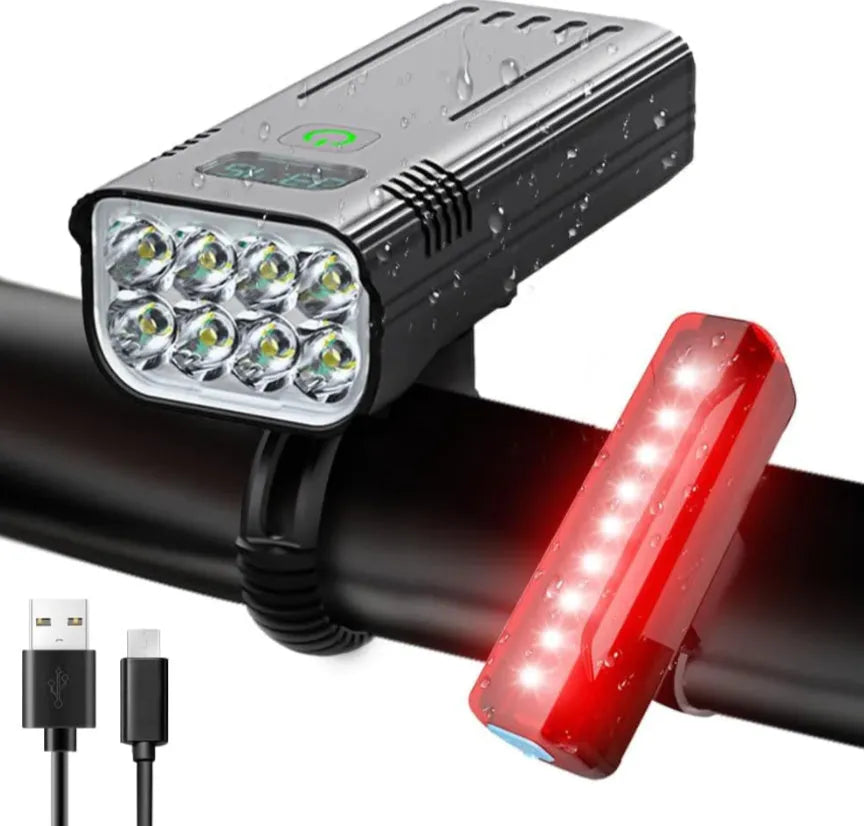 Black KX12DF digital bicycle headlight with display screen mounted on 360-degree quick-release bracket.