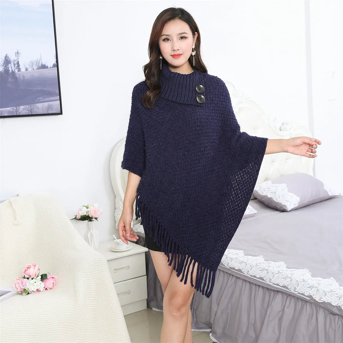 Women's acrylic knitted sleeveless cloak shawl in apricot colour with dot pattern