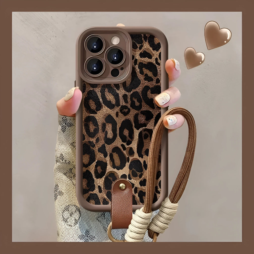 Brown leopard print silicone lanyard case for iPhone with hands-free strap.