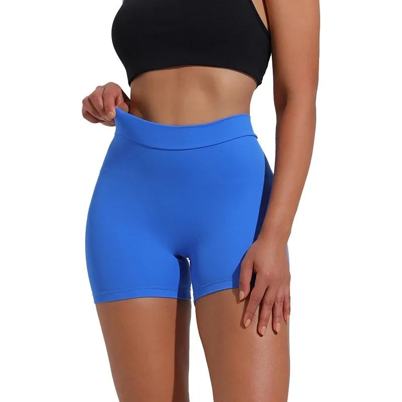 Women's nylon tight training shorts in black, side view, showing fitted cut and elastic waistband.