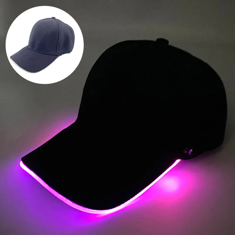 Black Halloween baseball cap with LED pumpkin smile face and yellow lights illuminated.