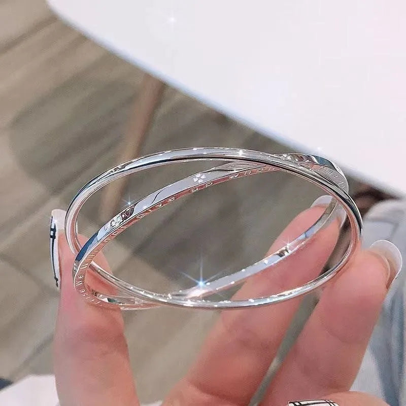 Women's silver-plated copper closed double ring bracelet in a geometric shape, smooth surface, available in 56mm to 62mm sizes