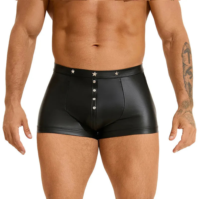 Men's black PU leather boxer shorts with U pouch design laid flat, showing sleek material and construction.
