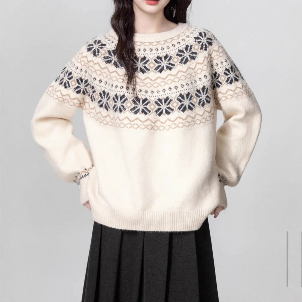 Women's milky white fair isle geometric pattern knit pullover sweater on a hanger.