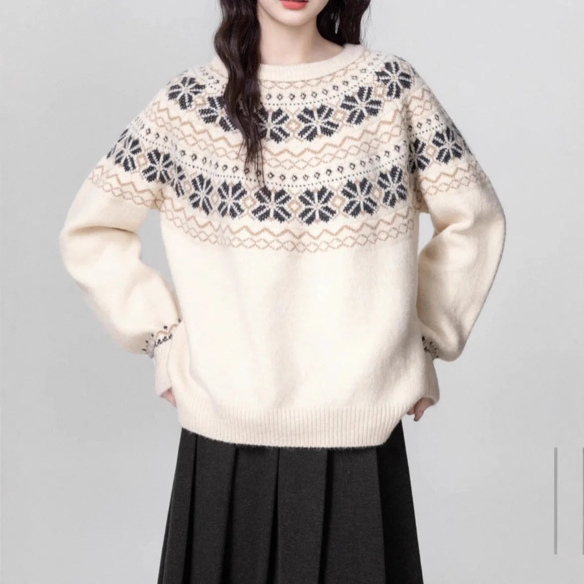 Women's milky white fair isle geometric pattern knit pullover sweater on a hanger.