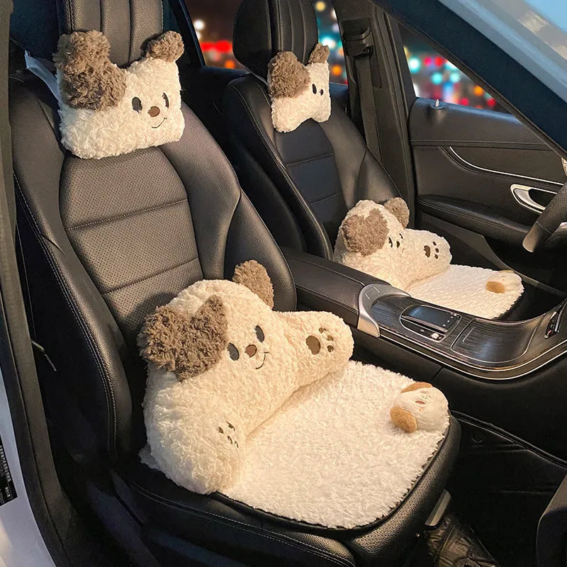 Puppy plush car headrest cushion and matching lumbar support pillow on a car seat.