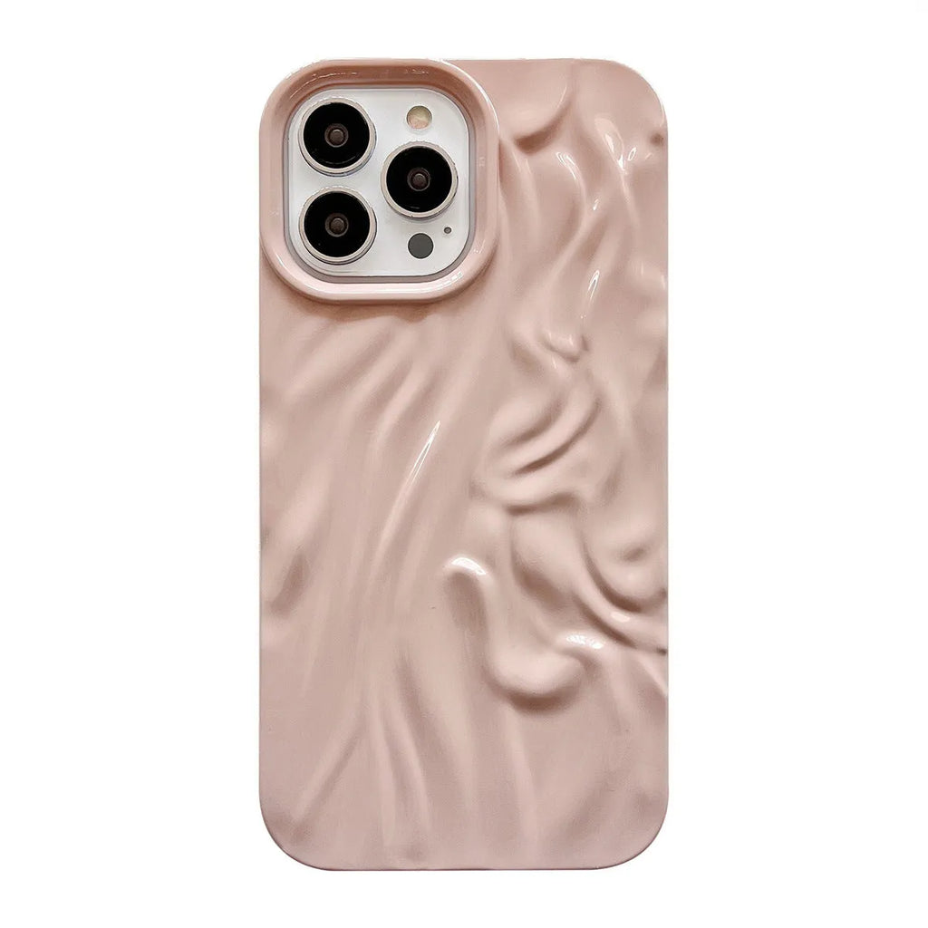 Milky white silicone iPhone case with a water ripple texture on a table.
