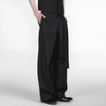 Black straight-leg trousers with a single pleat and adjustable waistband laid flat.