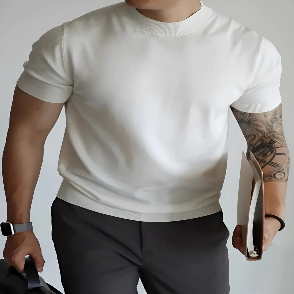 Men's slim-fit knit T-shirt in breathable polyester available in eight solid colours
