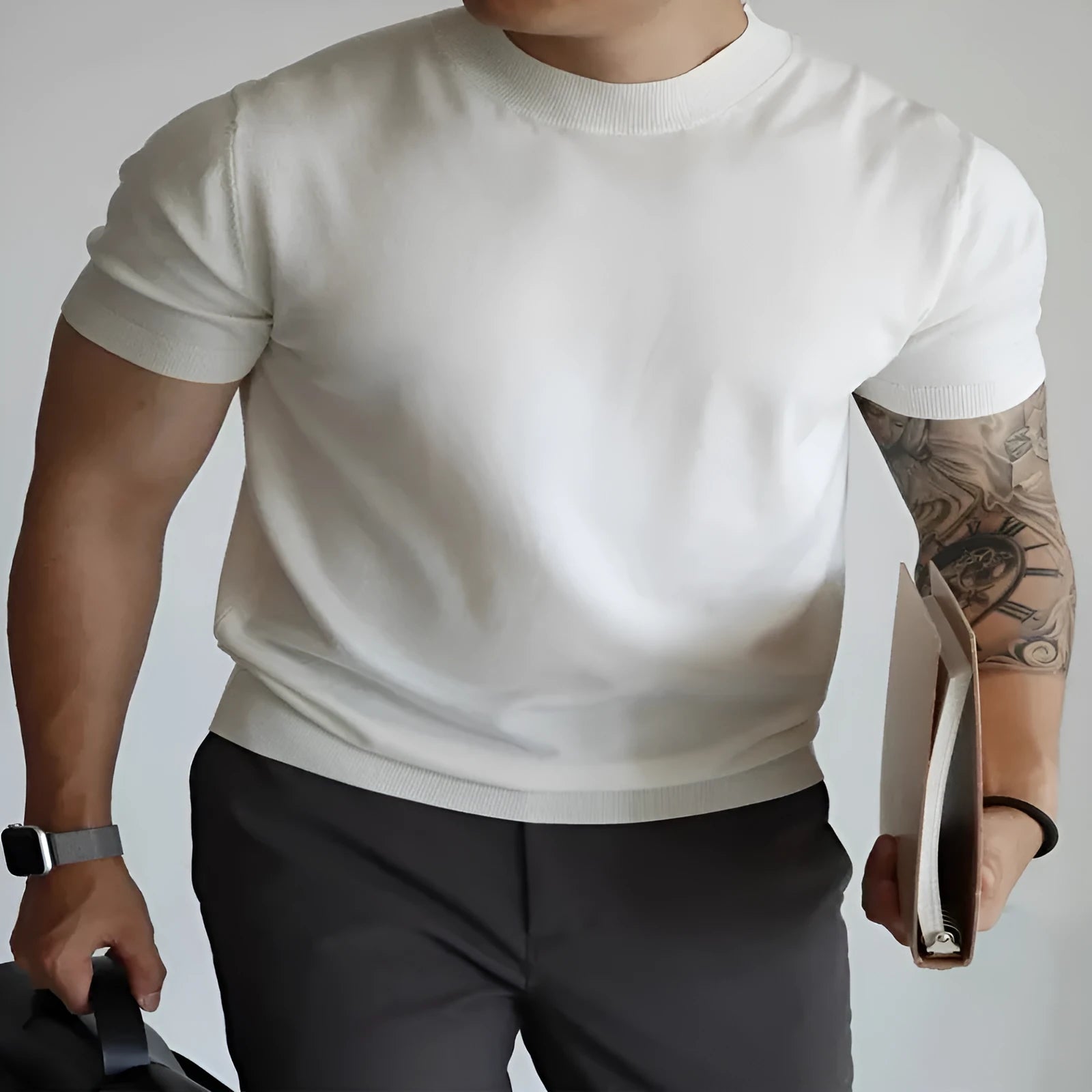 Men's slim-fit knit T-shirt in breathable polyester available in eight solid colours