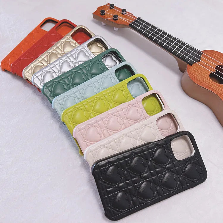 Leather silicone iPhone case with heart and plaid pattern in milk blue, pink or black