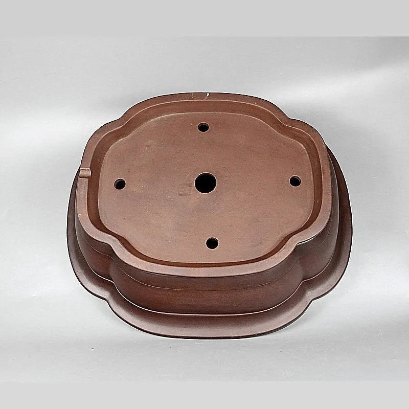 Handmade Chinese style crabapple-shaped purple clay flowerpot for plants.