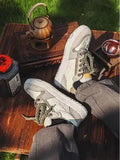 Green low-top casual shoes with star pattern, mesh lining, and a thick rubber sole.