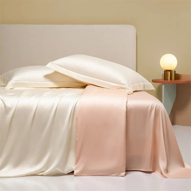 Lenzing Tencel quilt cover and pillowcase set in Aurora Blue, neatly arranged on a bed.