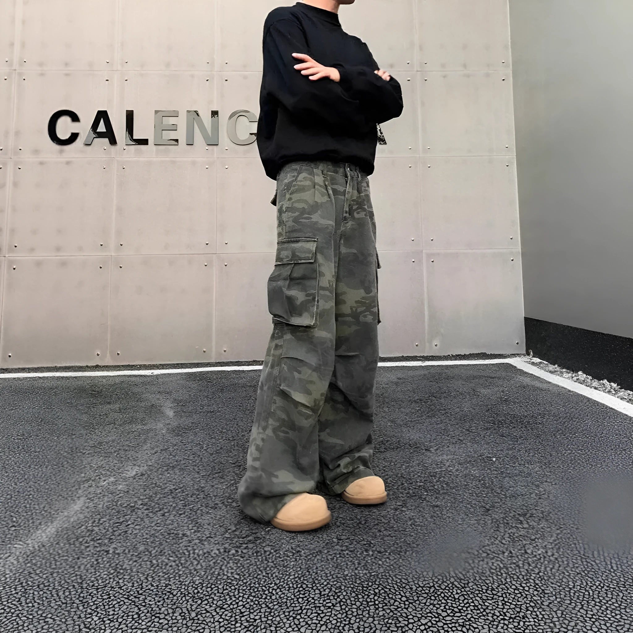 American vintage style crumpled camouflage cargo pants with multiple pockets on a mid-waist fit.