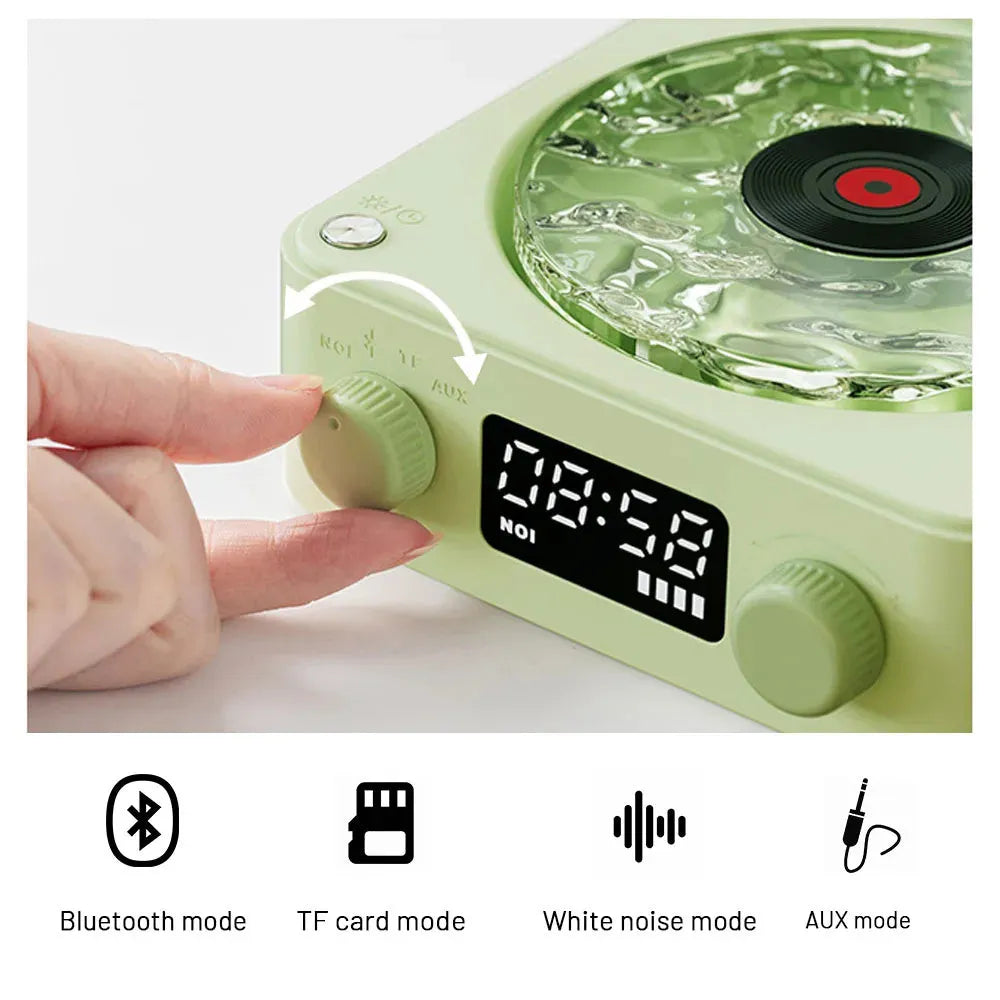 Retro turntable Bluetooth speaker with rotating transparent disc and RGB lighting effects