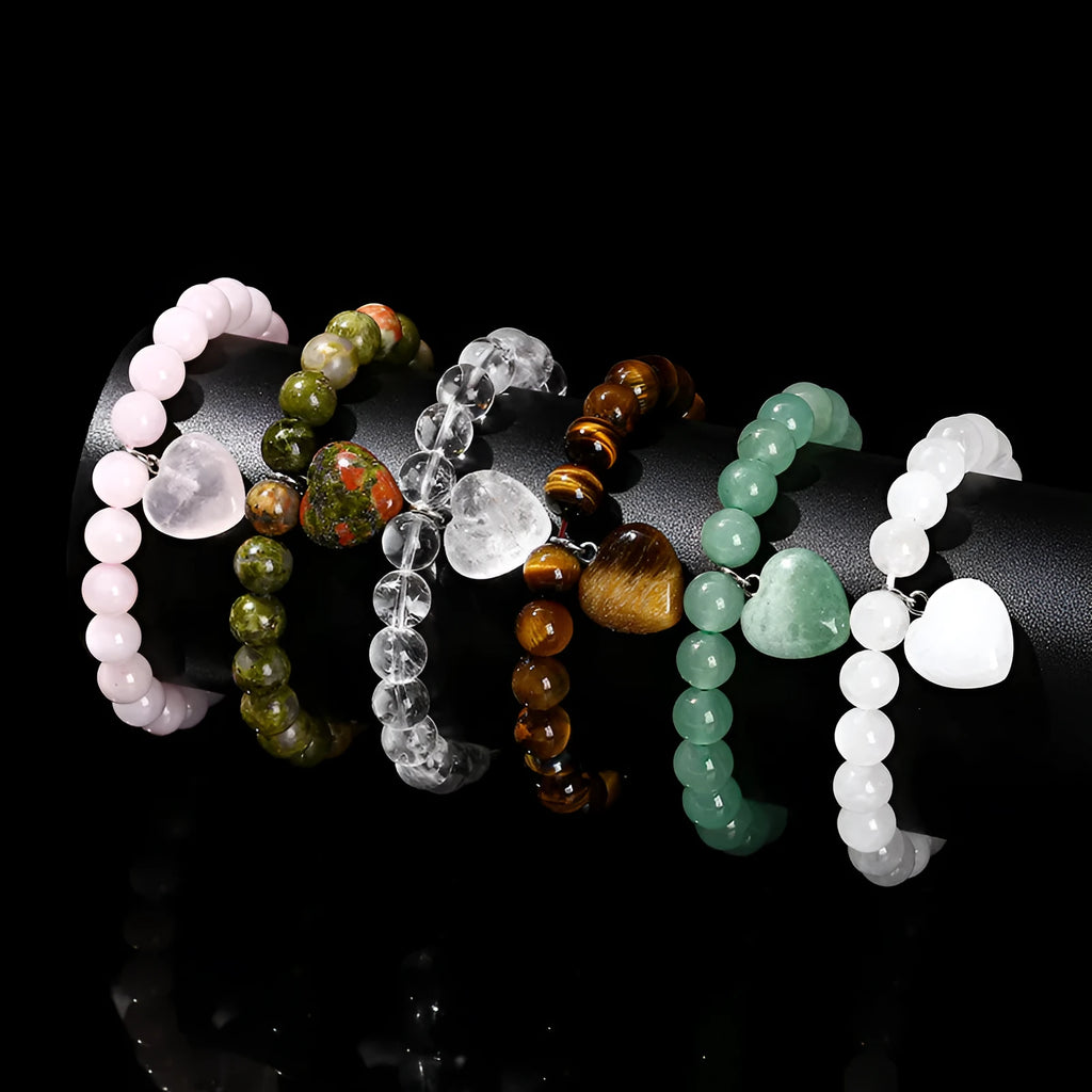 Natural stone bracelet with geometric love pendant in tigereye, crystal, aventurine, jade, and unakite stones