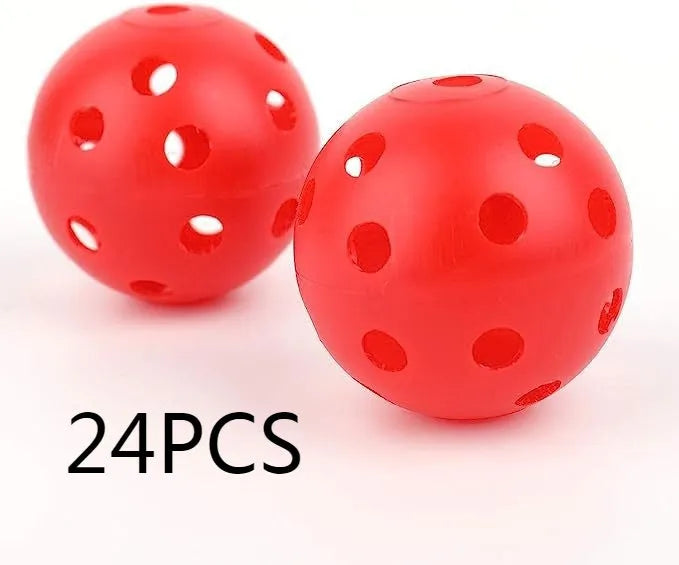 Multi-colour golf practice balls with 26 holes on a green surface.