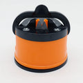 Small suction cup knife sharpener with ABS blade, 65 x 65mm, in red, yellow, green, blue, orange, black, white, or gold.