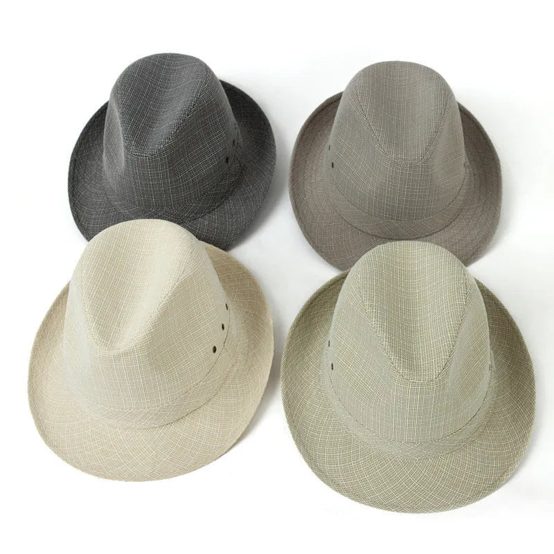 A classic brown fedora hat with a pinched crown and medium brim on a wooden table, showing its structured silhouette.
