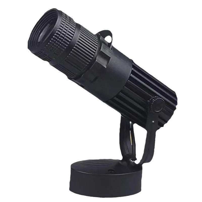 Black surface-mounted LED spotlight with aluminium shell for commercial restaurant lighting.