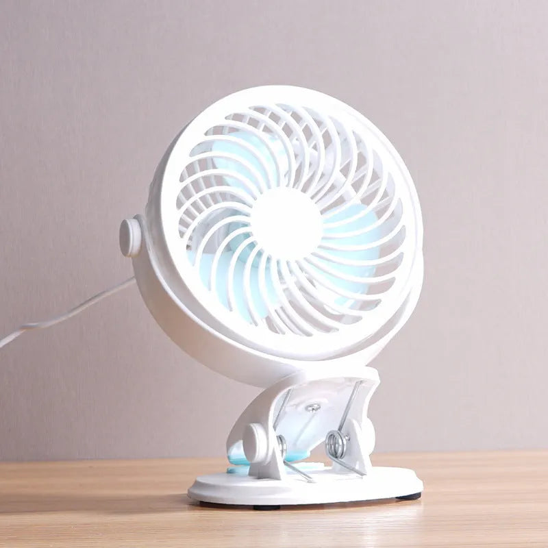 Compact USB-powered desktop fan with three blades and mechanical controls for quiet operation below 36dB