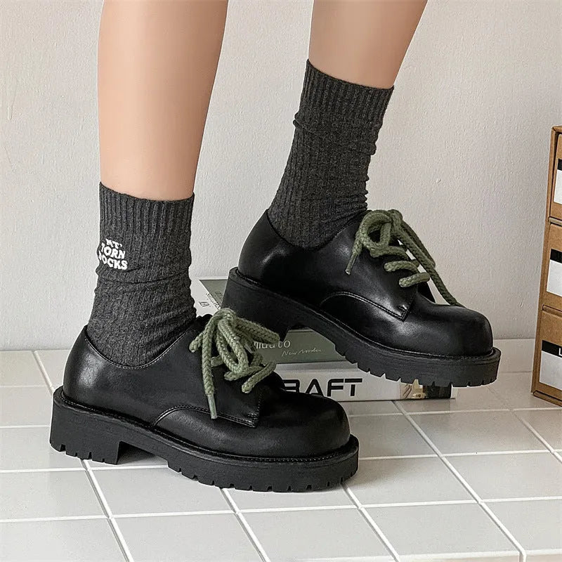 Derby-style platform casual shoes in leather with rubber sole for height increase