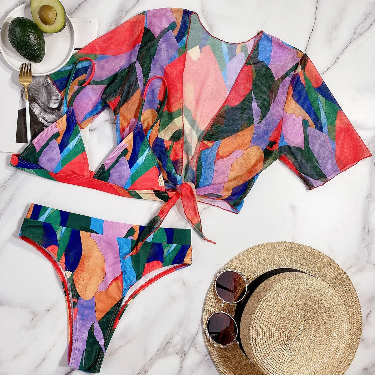 Red women's split-style swimsuit with a printed pattern, for swimming and surfing.
