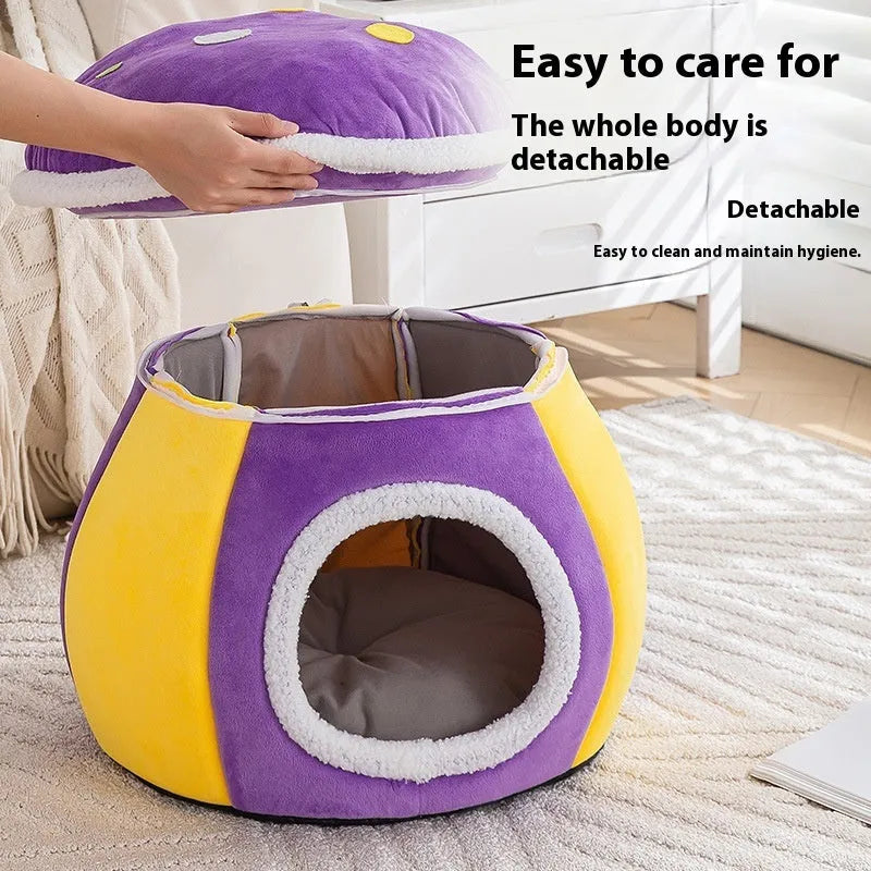 Grey plush mushroom-shaped cat bed with a high, padded rim and a cat curled up inside.