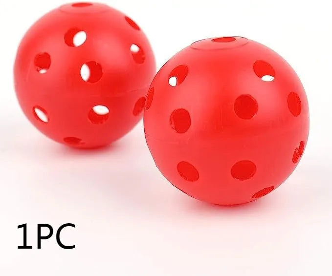Multi-colour 42mm polyethylene golf practice balls in a net bag.