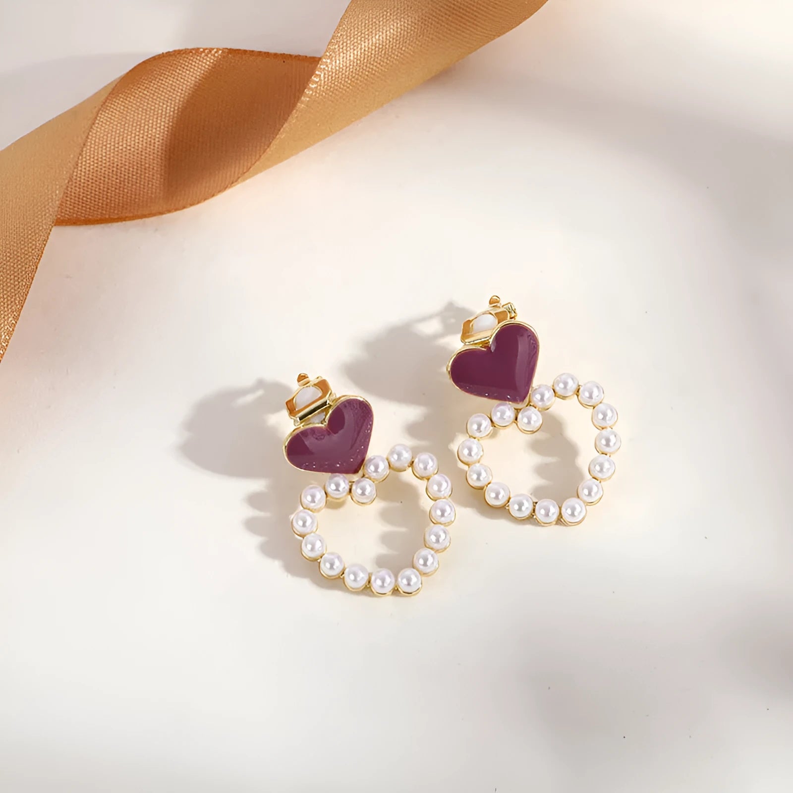 Geometric tassel clip-on earrings for women without piercings, brass and stainless steel construction.