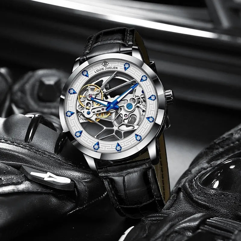Men's silver case mechanical watch with white dial, blue hands, and a black genuine leather strap.