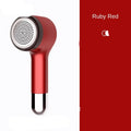 Hair ball trimmer with USB charging port and stainless steel cutting net in selected colour
