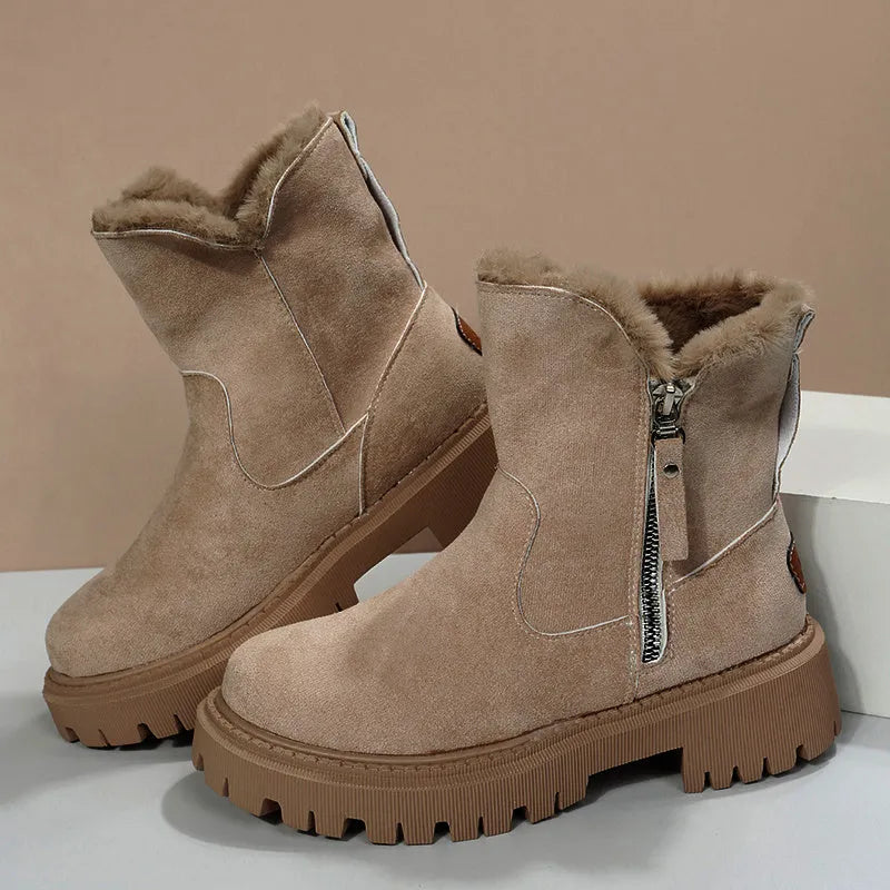 Women's black faux suede high-top snow boot with side zipper on a non-slip rubber sole.