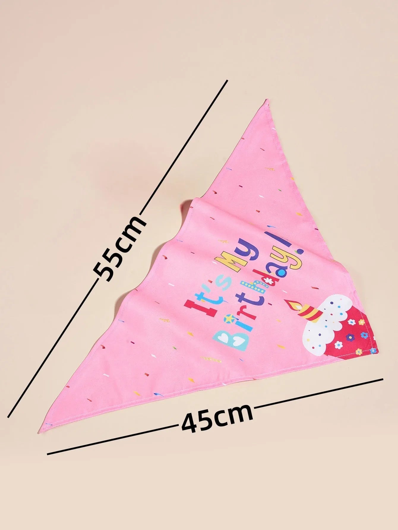 Printed polyester dog birthday hat and drool towel set in cartoon style with blue and pink colour options.