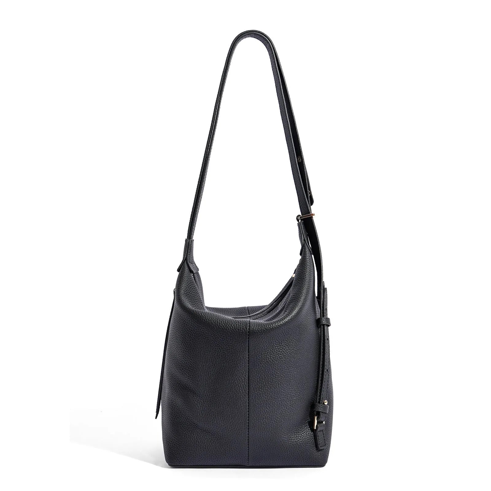 Women's large grey genuine leather bucket bag with a soft handle on a casual outfit.