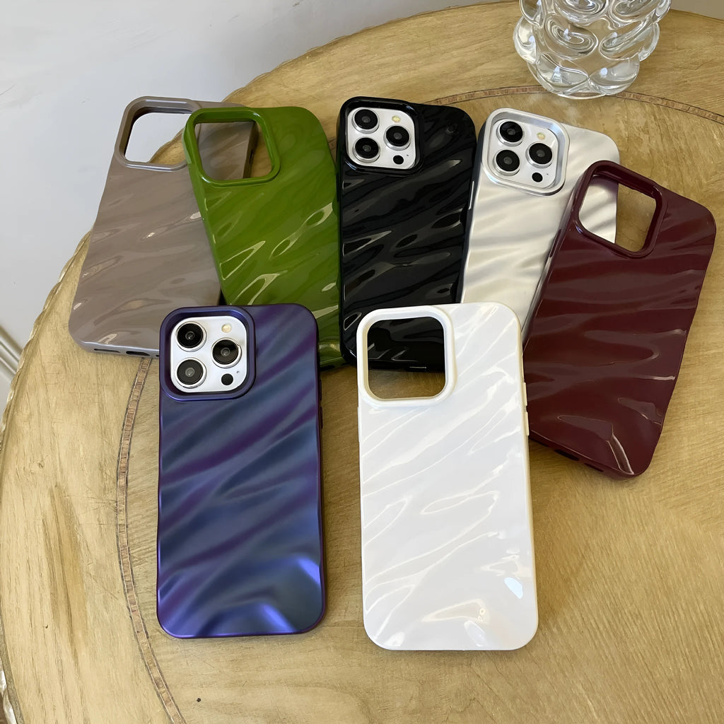 Soft solid colour wave pleated phone case for Apple iPhone 17 on a neutral background