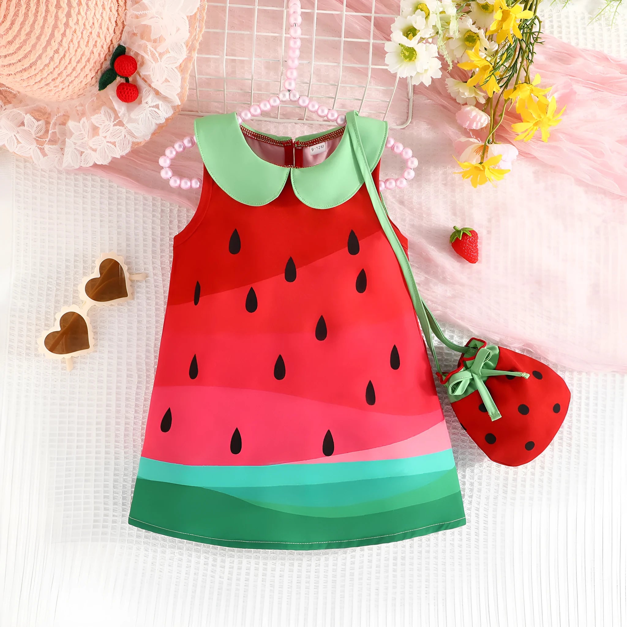 Girls fruit printed sleeveless dress in cartoon pattern, polyester fibre, available in sizes 6 months to 3 years