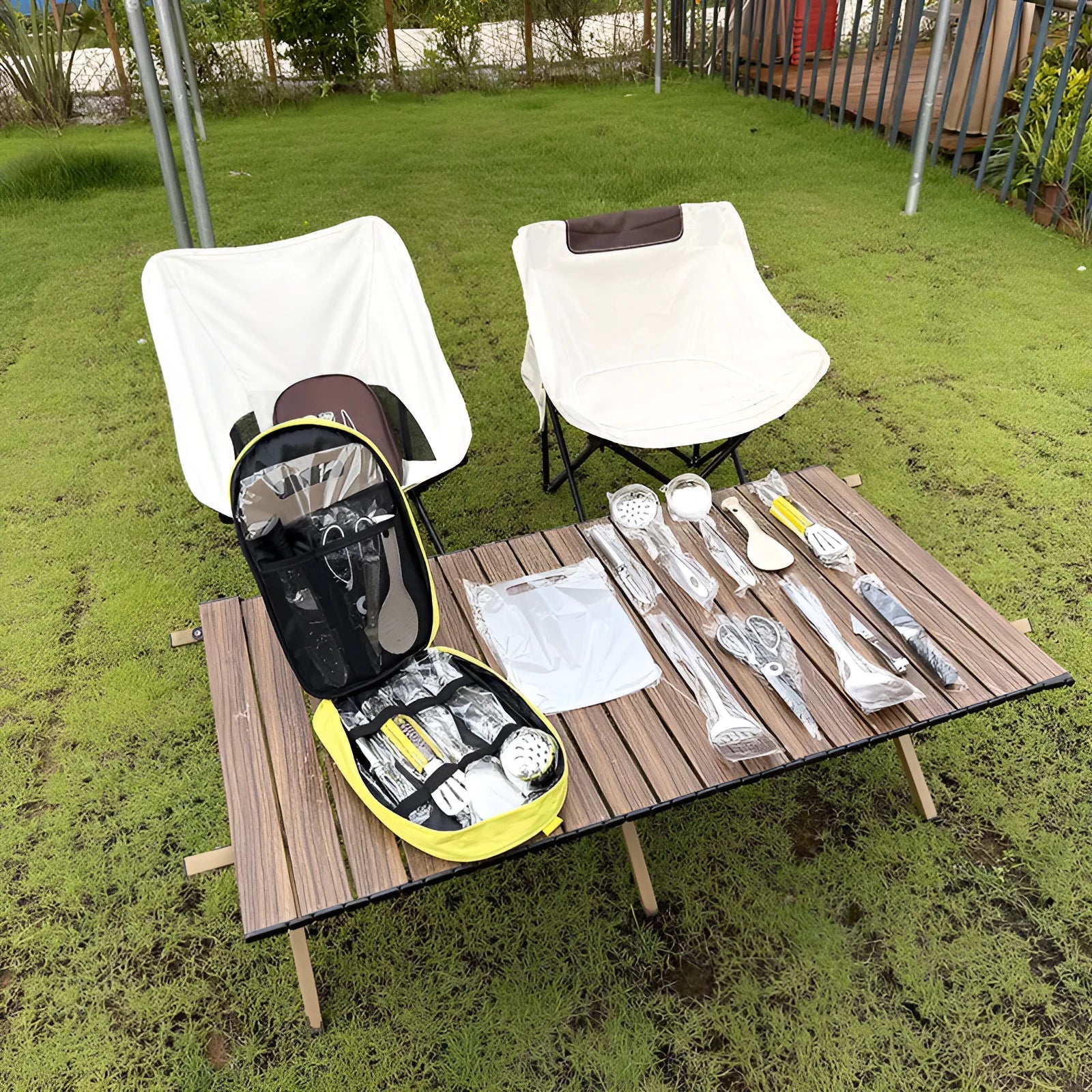 12-piece stainless steel picnic kitchenware set in a portable khaki storage bag