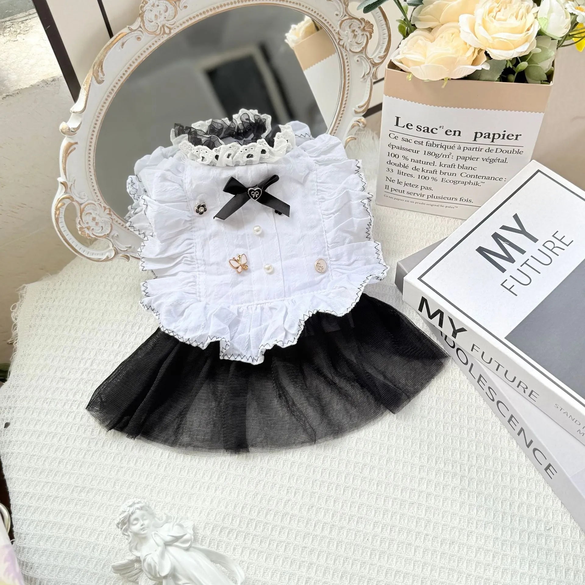 White polyester gauze princess-style skirt on a small dog, showing flowing design and fit.