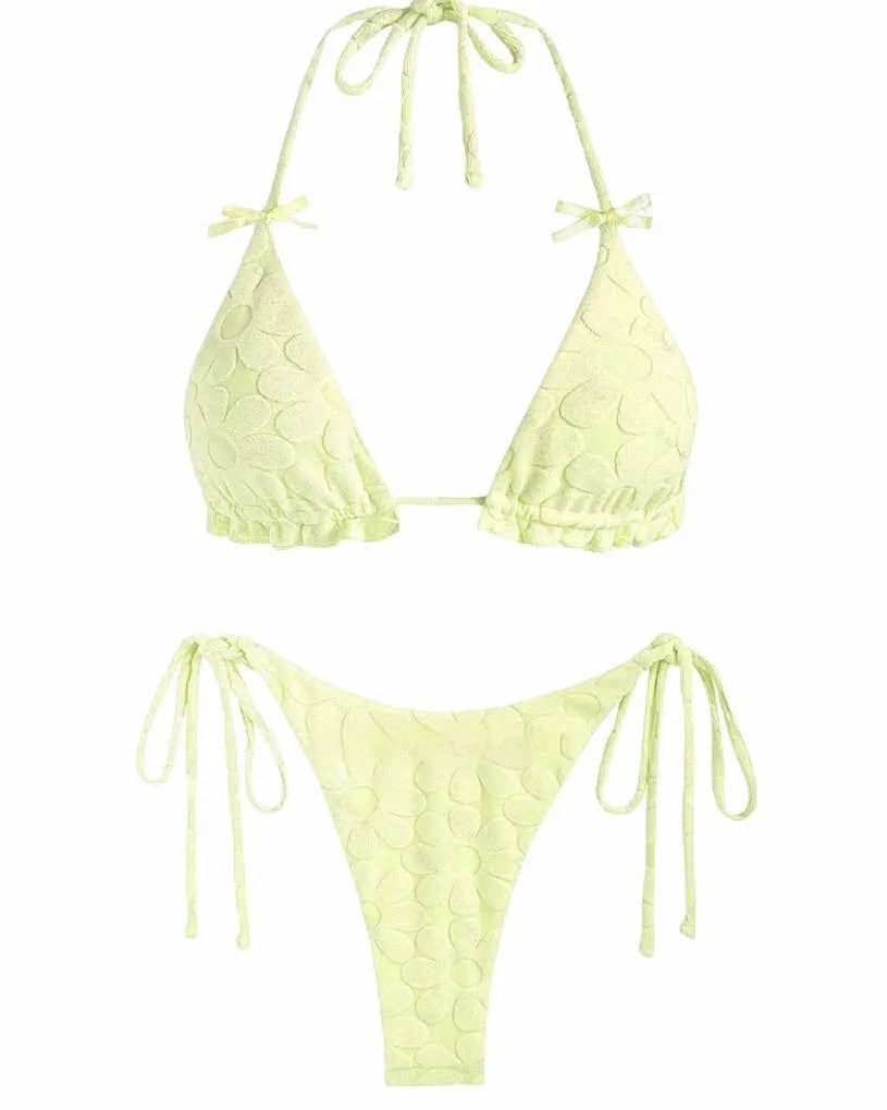 Light blue women's backless bikini set with wind strap design on a mannequin.