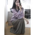 Purple women's sleeveless sweater with hollow-out design and shoulder strap detail.