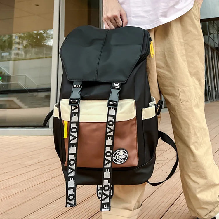 Oxford cloth backpack in black, green, or red, showing handheld and shoulder strap carry options