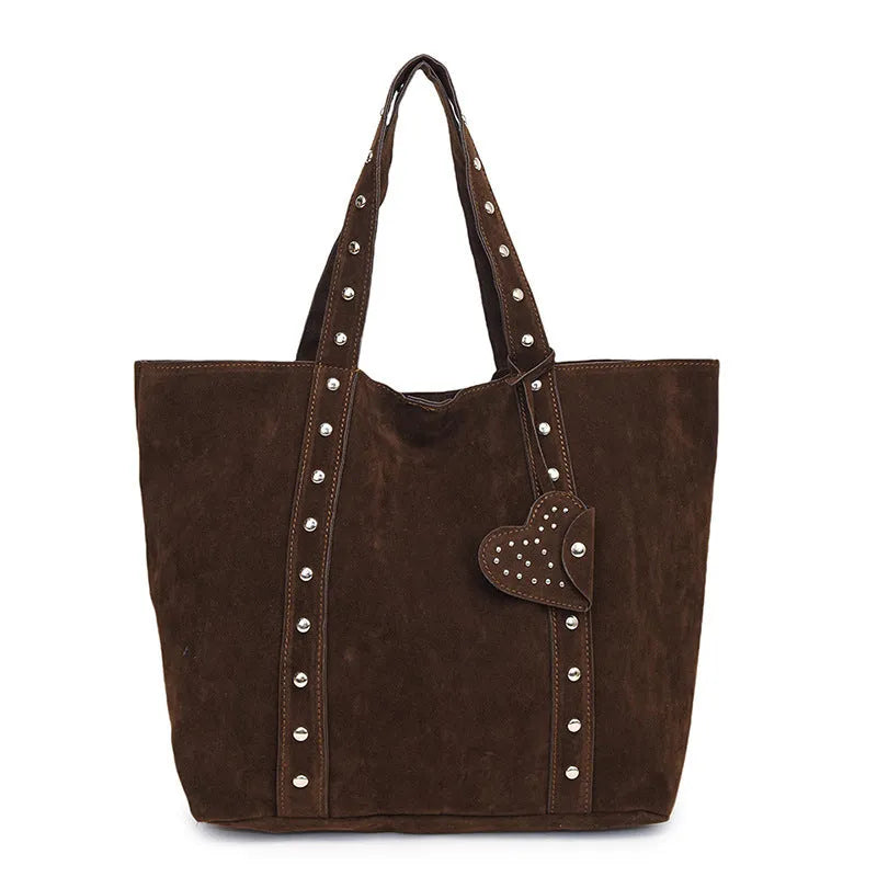 PU tote bag with double shoulder straps in black showing horizontal square shape and sandwich pocket exterior